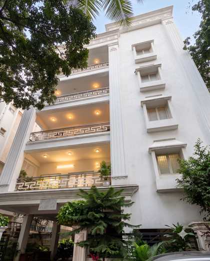 The white façade of Titiksha, home of Renu’z Homestay, in P.S. Nagar, Masab Tank